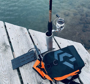 Dock Rod holder next to bag and water