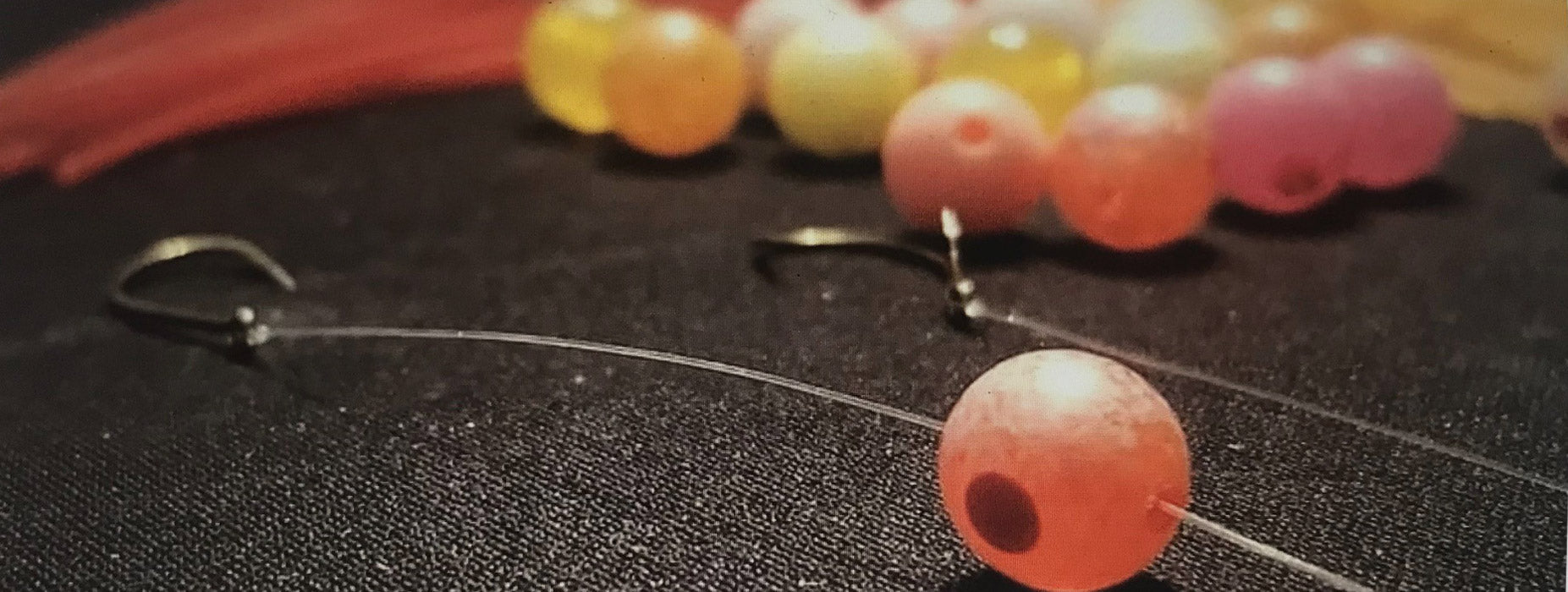 Close up of beads on a line with a hook